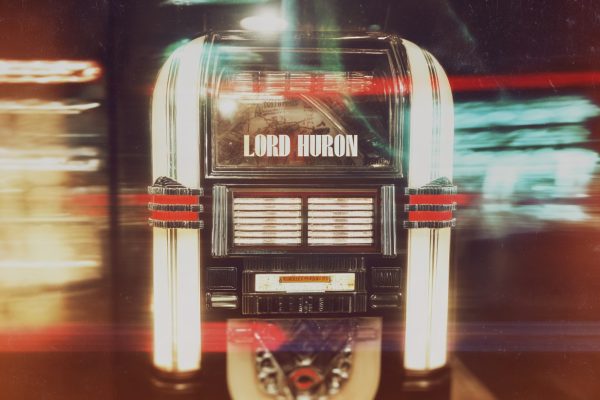 imagine a Polaroit-Photo of a Retro-Jukebox from the 80s, with a glass cover on top. Text "LORD HURON" --ar 4:3 --raw --stylize 0 --v 7 Job ID: a240e085-245a-4e56-8ae7-964714902726